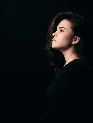 people woman wearing black shirt human