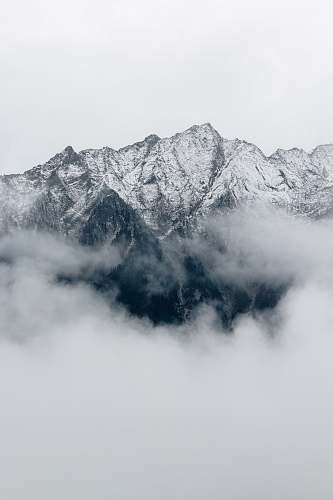 nature gray mountain covered in fog during daytime rieserferner-ahrn nature park