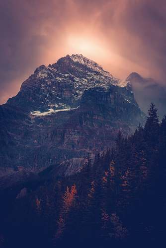 nature photo of mountain with trees in vicinity crest