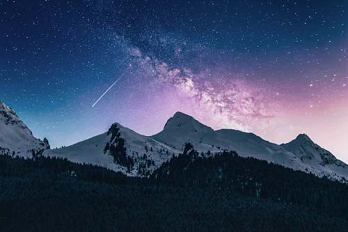 landscape snow mountain under stars sky