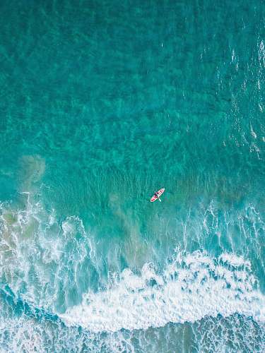 water aerial view of person at the boat on the ocean nature