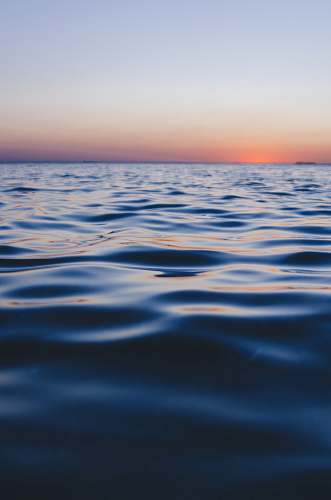 sea photography of calm body of water ocean