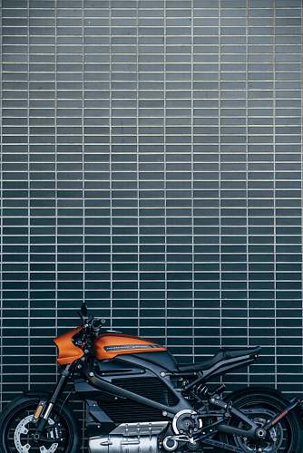 motorcycle orange and black motorcycle vehicle