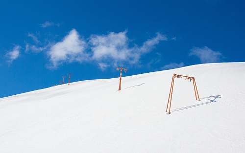 italy snow mountain with orange pole winter