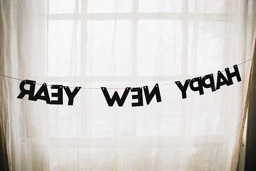 text happy new year hanged decor curtain