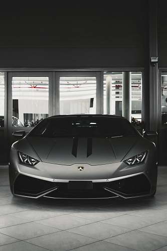 car gray coupe on parking area grey
