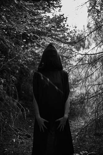 apparel gray scale photo of person wearing hijab clothing