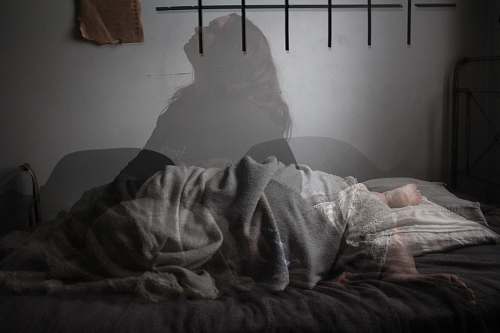 toronto shadow of woman on bed canada