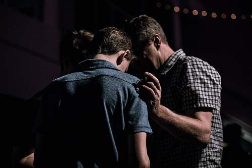 person men touching each other's foreheads human