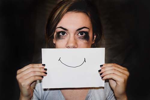person person holding white printer paper human