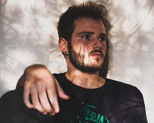 human man wearing black shir t face