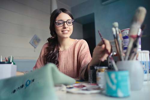 human woman holding paint brush people
