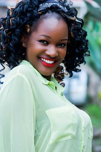 human woman wearing green button-up shirt people