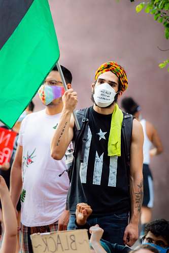 apparel man in black tank top holding umbrella clothing