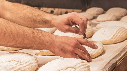 food person baking pastry dough