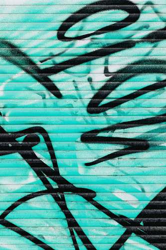 blue selective focus photography of gratify wall poland
