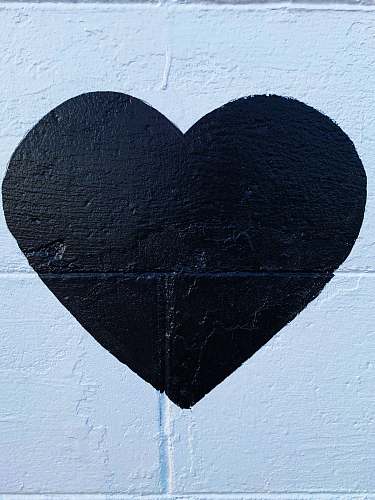 rug black heart printed concrete wall black