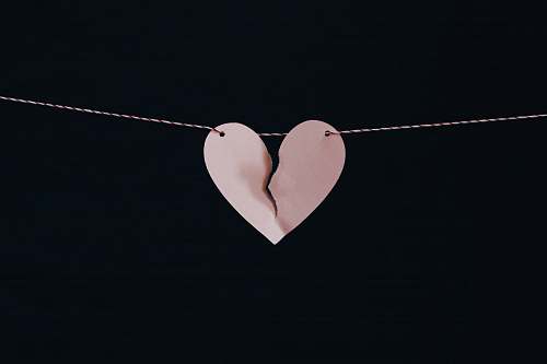 love broken heart hanging on wire broken