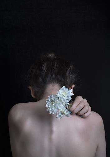 human woman holding flower person