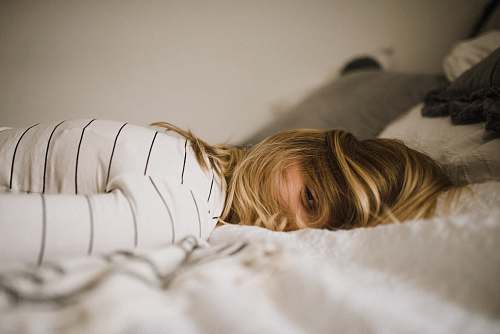munich woman lying on bed germany
