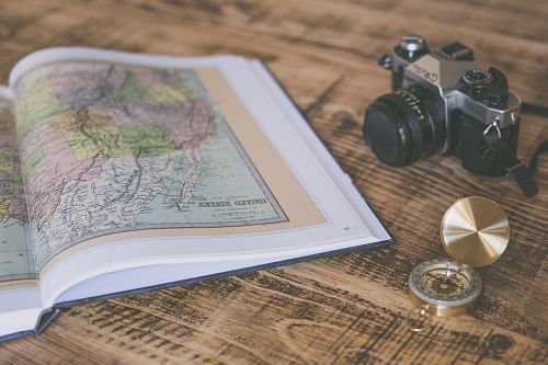 compass with map on table