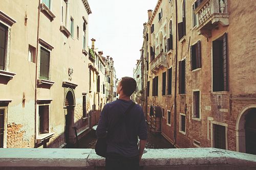 man standing in bridge