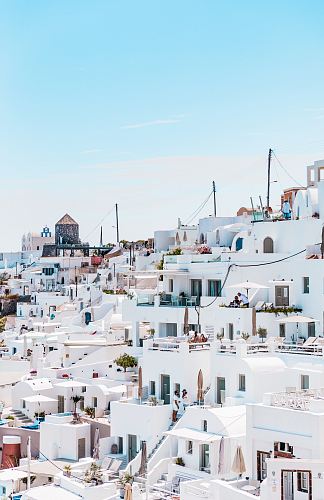 white concrete houses under blue sky at daytime