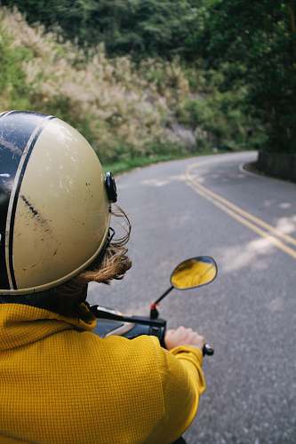 clothing person riding motorcycle apparel