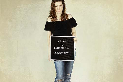 clothing woman holding signage apparel