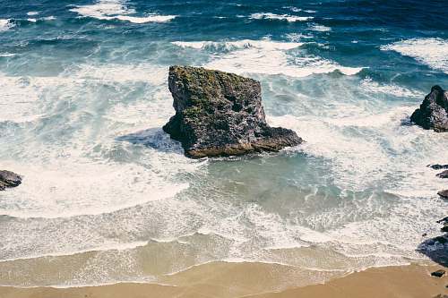 sea aerial view of seashore during daytime beach