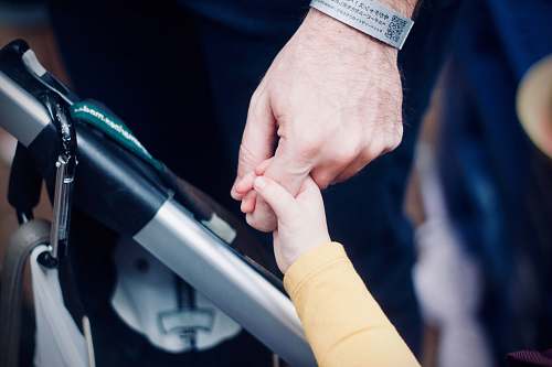 people person holding hands with child human