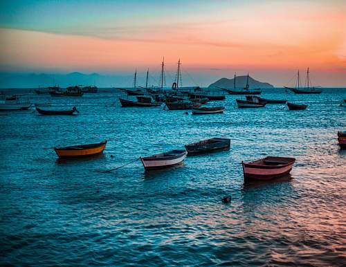 dinghy assorted-color wooden boat on body of water transportation