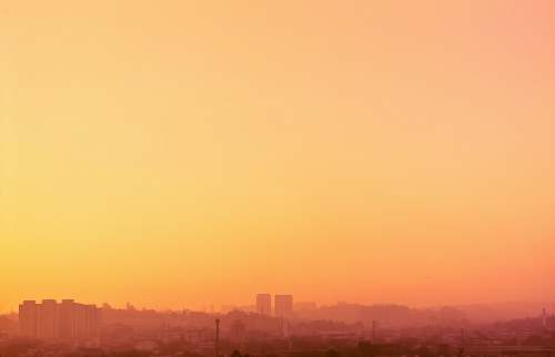 sunset city building during sunset sky