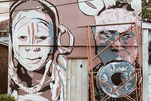 graffiti scaffolding placed in front of wall with graffiti porto alegre