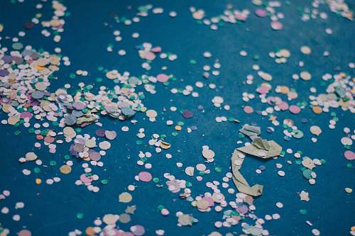 confetti selective focus photography of paper dot paper