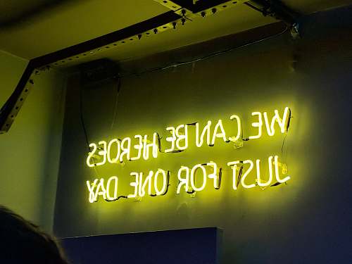 neon yellow neon light signage quote