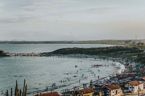 sea people on beach water