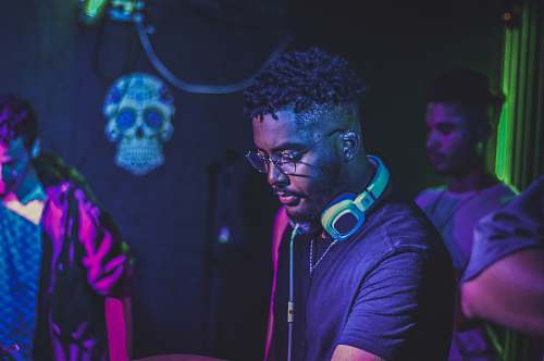 person man wearing blue headphones human