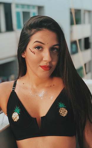 human woman wearing black sports bra face