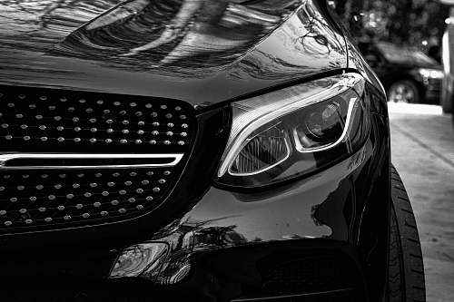 car grayscale photo of cars headlight automobile