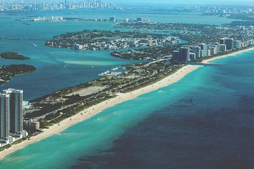miami aerial photography of city at daytime ocean