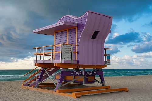 building purple and brown wooden Miami Beach cottage by the beach countryside