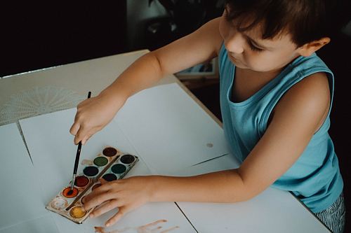 boy using watercolor
