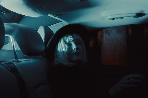 automobile woman sitting in vehicle car
