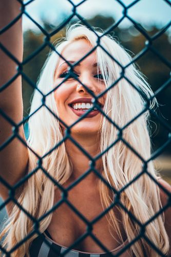 smiling woman wearing grey shirt
