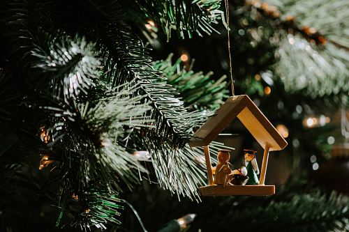 The Nativity of Christ-themed wooden Christmas ornament
