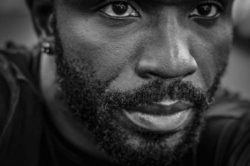 beard grayscale photography of man face