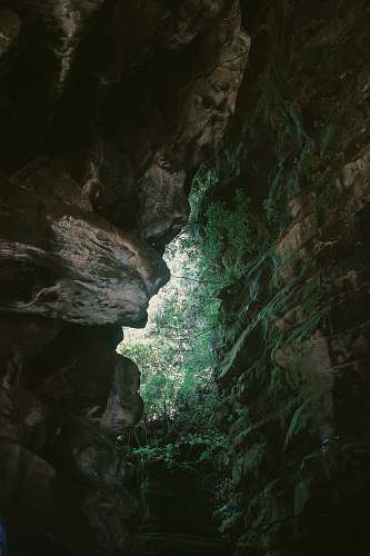 nature cave during daytime cave