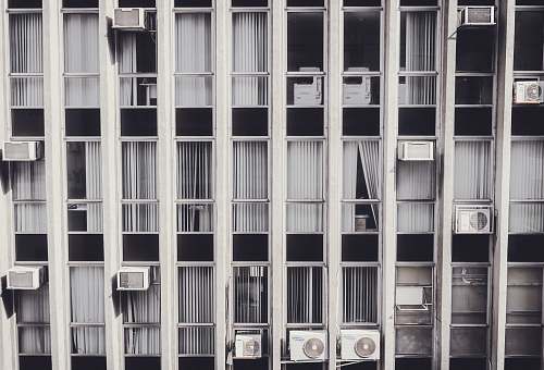 grey gray high-rise building ims