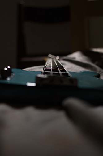 grey green and black bass guitar bass